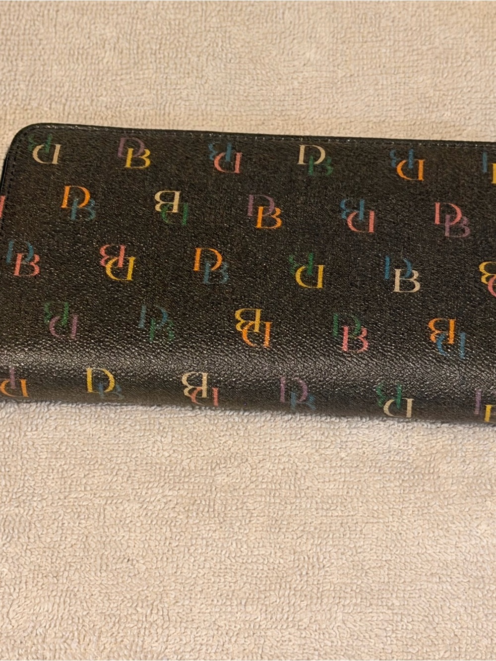 Vintage Dooney and Bourke multicolor zip around wallet
